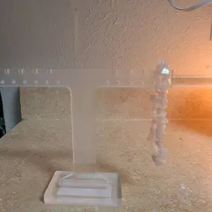 Rose Quartz Stretchy Bracelet - Simple Design Displayed on Clear Stand