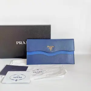 Pre-owned PRADA Calfskin Wallet Saffiano Wave Color block Long Snap Blue LNL0325