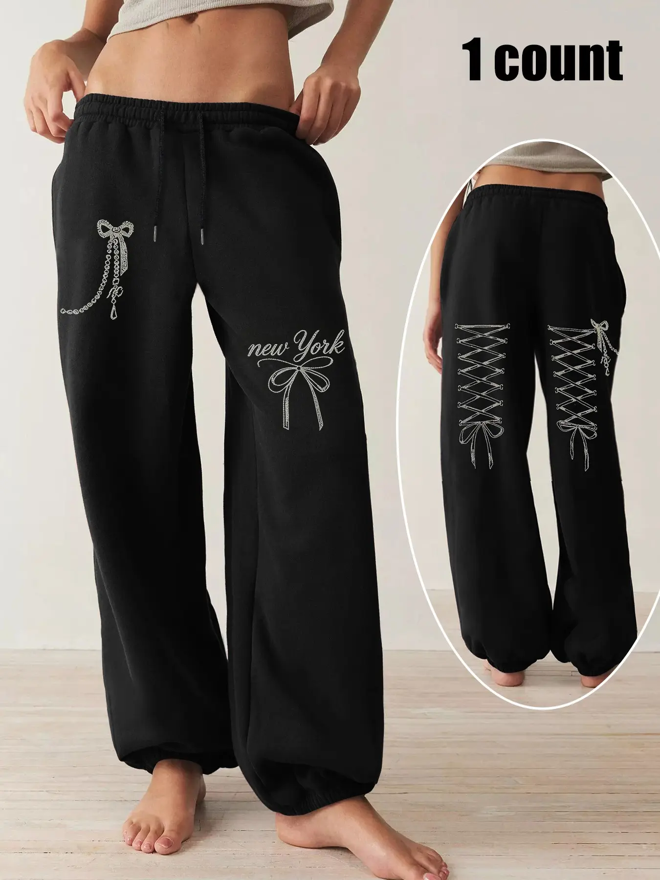 Women's Casual Cuffed Drawstring Relaxed-Fit Sweatpants ，Featuring bow, chain, and lace-up print details ，Perfectly suited for edgy, sweet, or cool-casual styles Comfortable everyday versatile trousers