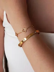 2-piece elegant gold 304 stainless steel bracelet set - floral pattern, hollow design, suitable for casual wear and special occasions, casual accessories | floral bracelet | exquisite craftsmanship Elegant Minimalist Bangle