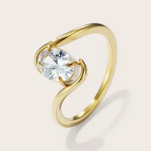 Minimal Glow Ring - Elegant Gold Tone Band with Sparkling Oval Stone for Everyday Wear