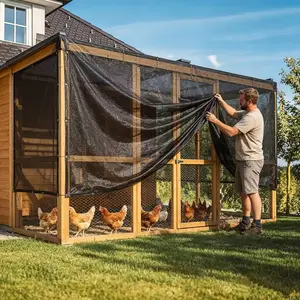 A 10-foot by 13-foot black breathable sunshade net with buttoned edges, suitable for providing all-round shade for farm animals, greenhouses and garden areas.