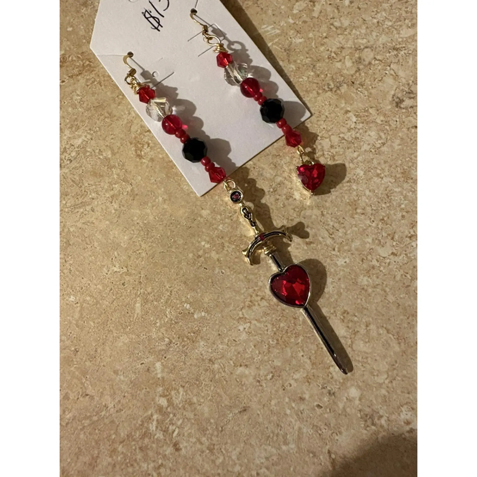 Red and Black Heart-Shaped Earrings with Beads and Sword Design