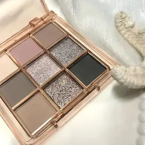 9-color eyeshadow palette, matte and shimmer eyeshadow palette, highly pigmented, long-lasting and waterproof blend, creates charming eye makeup, smoky gray, brown, and pink tones, smooth texture, makeup essential, professional eyeshadow,