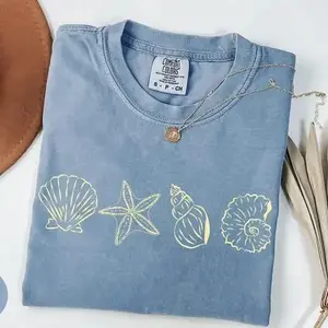 [Made in USA] SeaShell T-Shirt, Preppy Beach Graphic Tee, Coastal Aesthetic Shell Shirt, Oversized Ocean Lover Tee, Summer Beach Vibes Apparel, Gift for Teen Girls, Casual Everyday Wear