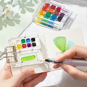 Travel-Friendly Watercolor Palette Art Set - 9pcs Kit Including 8/15 Grid Transparent Acrylic Magnetic Box, 6 Brushes, Clip and Portable Sketchbook for Artists