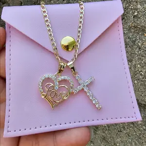 Corazon love con cruz necklace