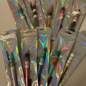 Random Pen Grab Bags - Decorative Pens with 3 Free Refills for Each Pen Featuring Colorful Beads and Holographic Packaging