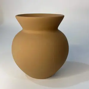 Orange clay vase