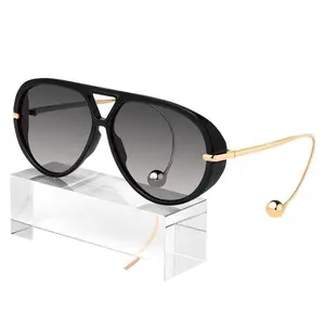 Trending Oversized Aviator Sunglasses with 70s Retro Vibe for Women Luxury 2026 Big Shield Frame Earring Accent UV-Protective Lenses American Retro Female Lead Style