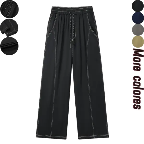 Men’s wide-leg pants with a visible contrast thread drawstring, featuring a relaxed casual style. Crafted from a supple, wear-resistant fabric that stands up to everyday wear, they incorporate segmented contrast threading to reinforce the silhouette. A st