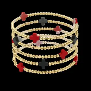 Multi Layered Gold Bead Stretch Bracelet with Cross Accent