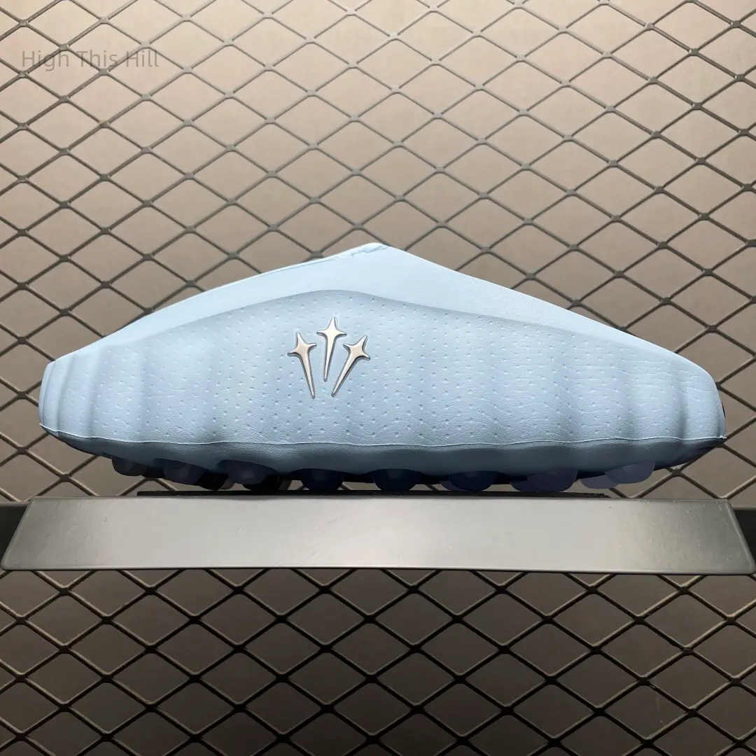 Soft Pale Baby Blue Integrated EVA Foam Slip On Clogs Full Tiny Dot Perforated Breathable Surface Side Vertical Hollow Cutouts Segmented Wavy Edge Bubble Round Shock Absorb Stud Outsole Waterproof Casual Slides For Gym Pool Beach Shower