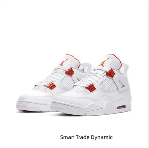 Retro Mid-Top Basketball Shoes in White Leather Upper with Metallic Orange Accents, Mesh Side Wings, and Visible Air Unit