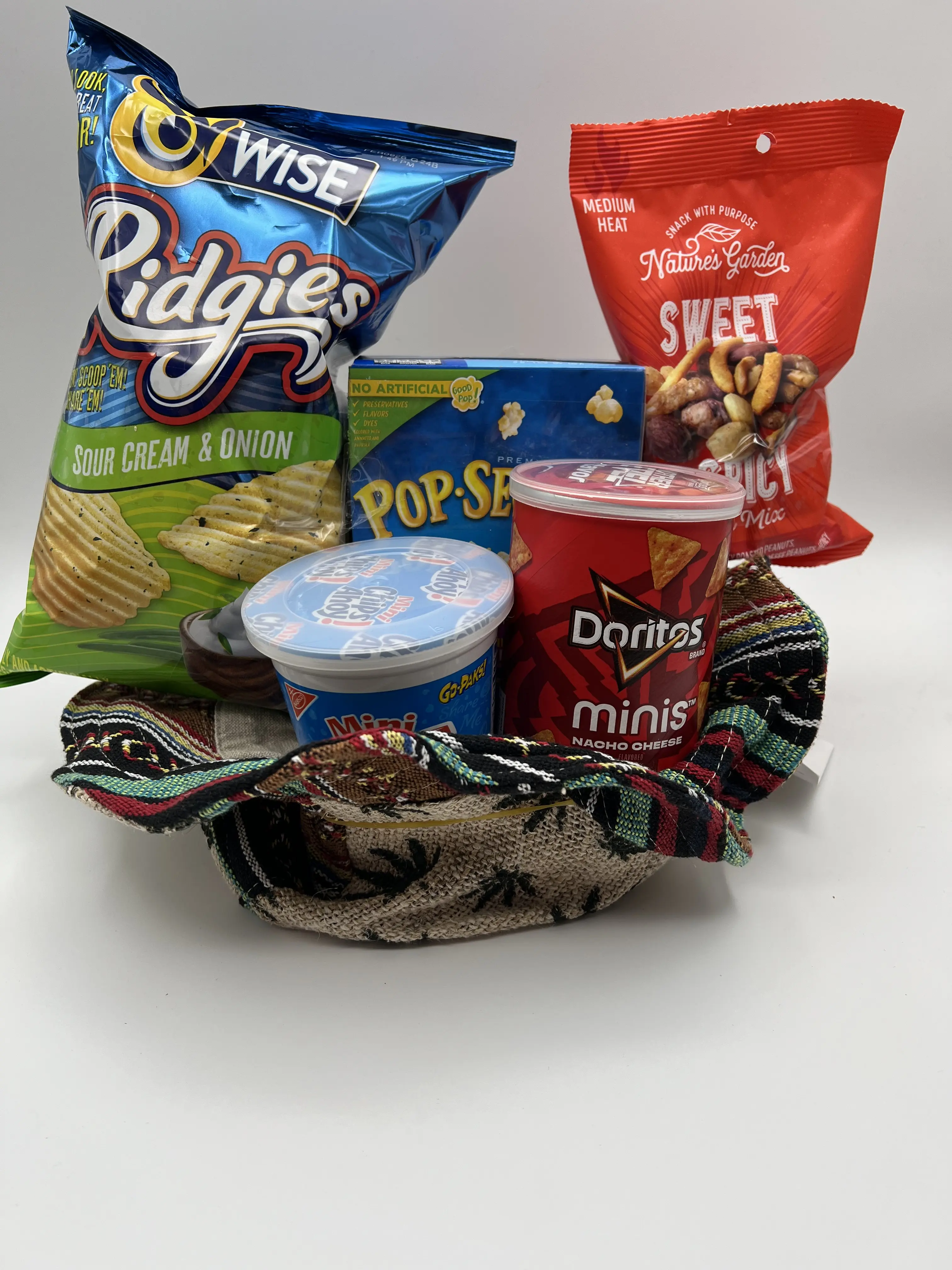 Groovy Grub Random Hat Purse Backpack Filled with Variety of Munchie snacks. Hats, backpacks, purses and snacks will vary.