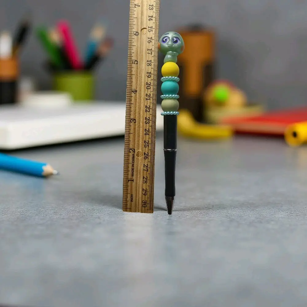 Friendly Spirit Writing Pen with Green Alien Beads Ergonomic Grip and 6 Free Ink Refills Perfect for Students Teachers and Sci-Fi Fans