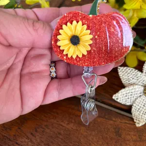 Sunflower Pumpkin badge reel. Seasonal Accessories. Thanksgiving. Nurse Key Card. The perfect medical gift to showcase your fall spirit.