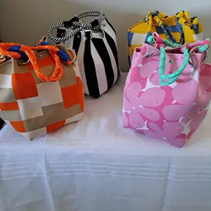 Women's Fashionable Bucket Bags in Vibrant Colors with Stylish Straps and Unique Patterns