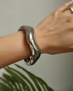ASTRID WIDE WAVY SILVER STATEMENT BRACELET