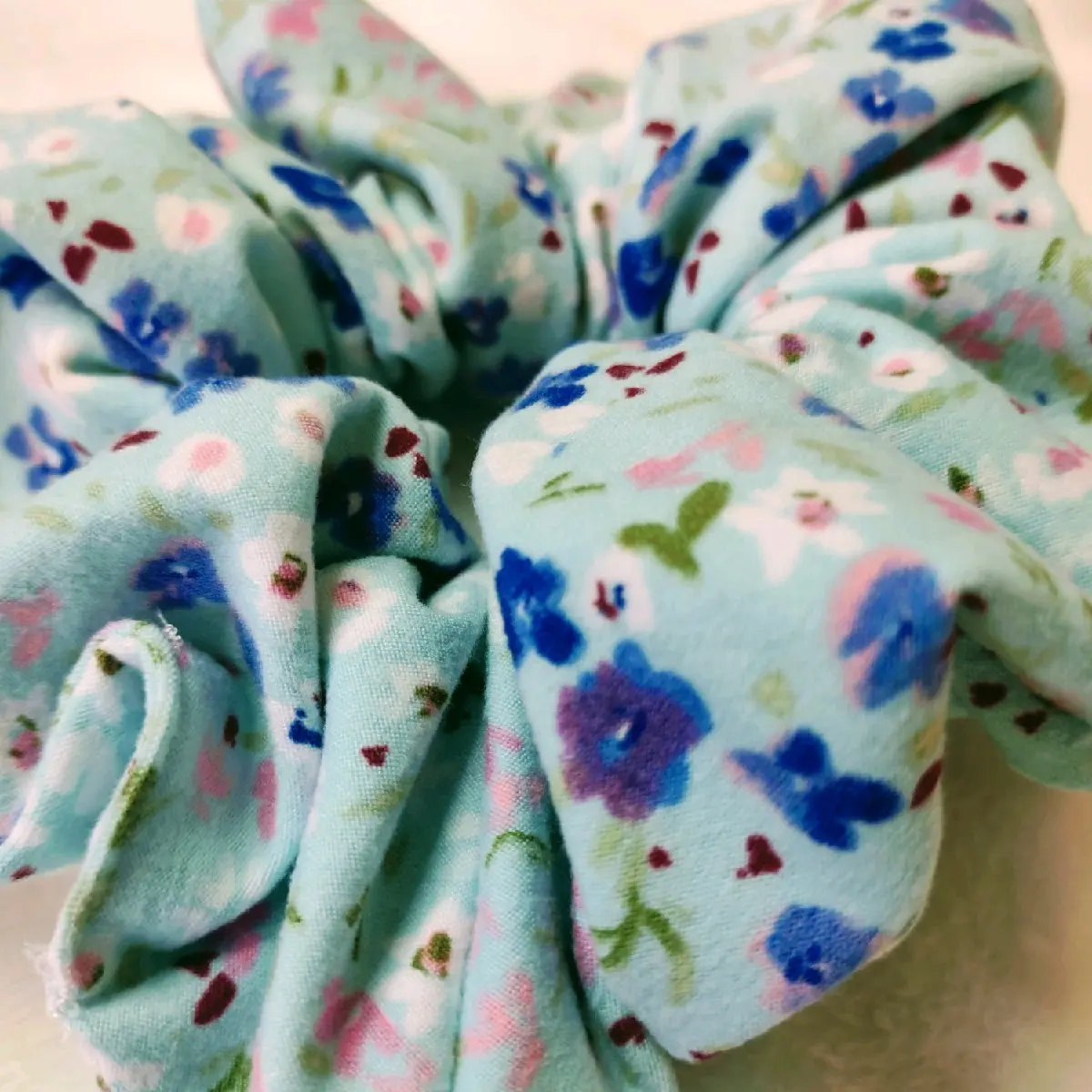 Light blue floral print scrunchie
