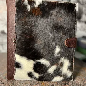 “ COWGIRL TRAPPER-KEEPER”  One of a kind hide and leather trapper keeper made by Hide and Chic