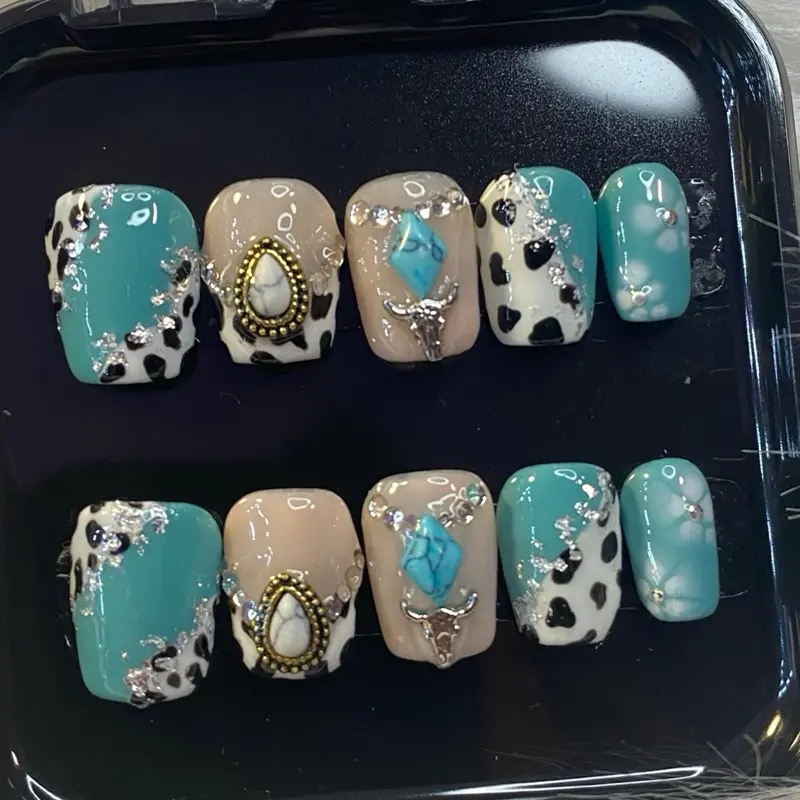 Western Cow Print Press On Nails with Turquoise Accents and Decorative Elements Rhinestone Teal Color