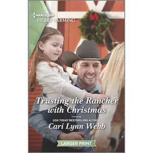 USED-Trusting the Rancher with Christmas: A Clean Romance by Webb, Cari Lynn (Mass Market Paperback)