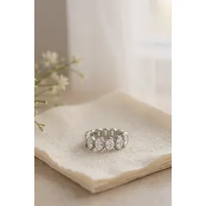 Oval bezel eternity band