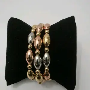 18K Gold Plated 3 in 1, 3 Tone  Elastic Big Oval shaped Beaded Bracelet with Smooth Texture "Diamondcut"