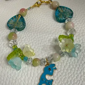 Handmade Bead Bracelet with Blue Deer Charm and Floral Charms