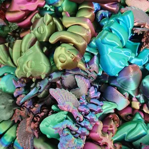 3D Printed Mini Mystery Packs. Articulated dinosaurs, sea creatures, and dragons!