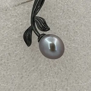 Pearl charm with black