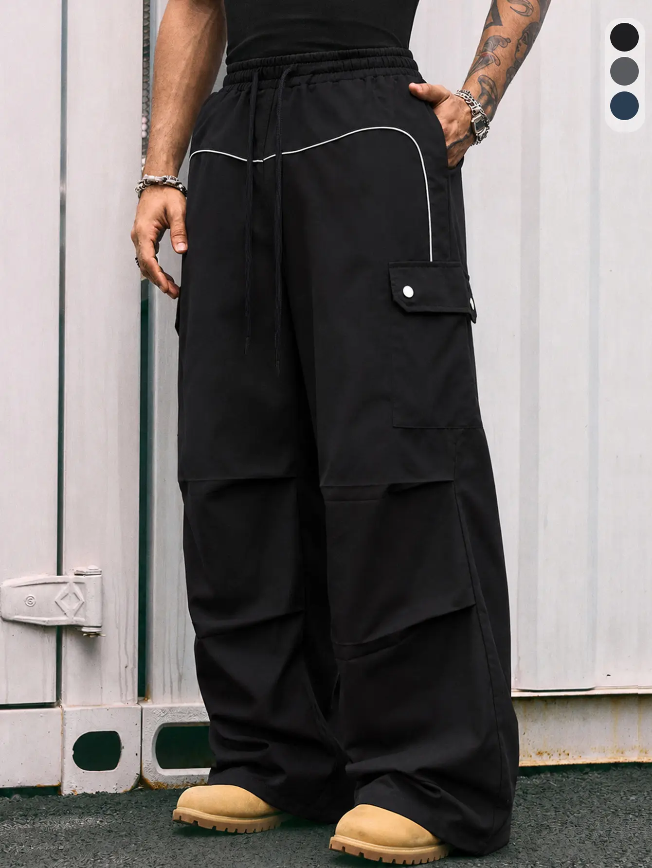 Men’s black wide-leg cargo pants — minimalist relaxed fit, commuter style, versatile design, hip-hop style, multi-pocket design, everyday casual style, lightweight fabric, street fashion styling, street sports style, drawstring cuffs, available in multipl