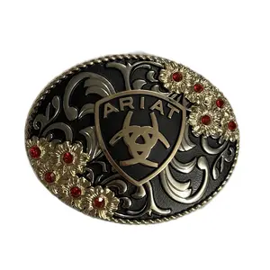 Ariat Belt Buckle with Intricate Design and Red Gemstone Accents for Western Fashion