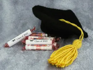 Graduation Cap with Tassle, Class of 2026! Comes with Smarties and Two Class of 2026 Scrolls. Fits on pint size canning jar which is not included.