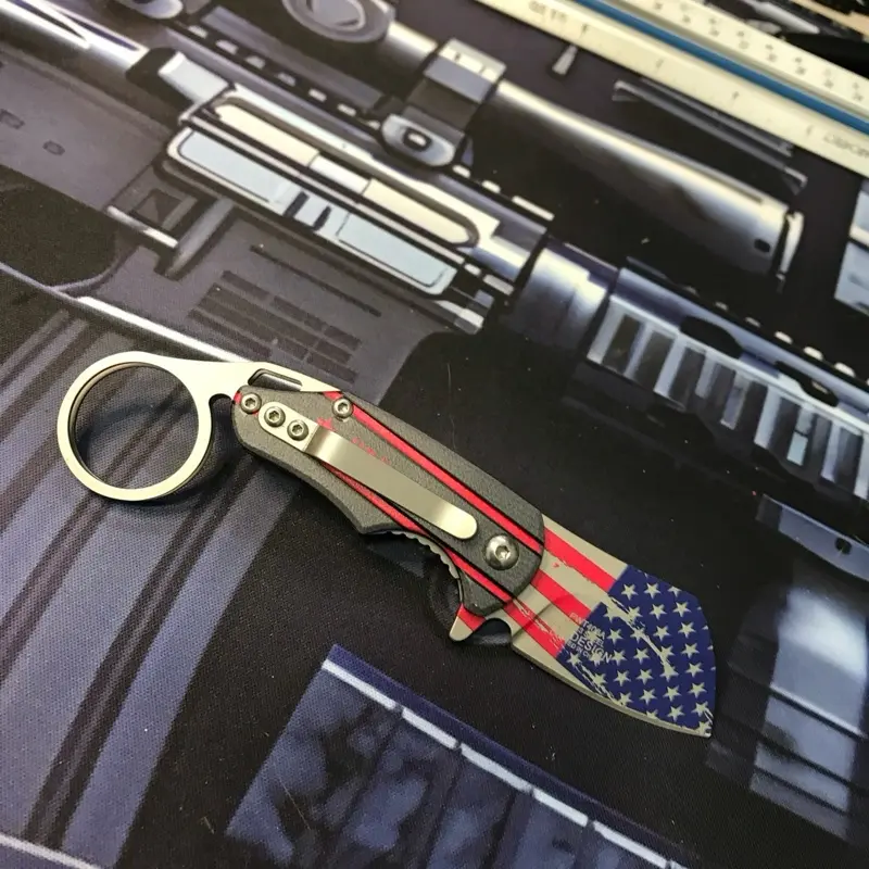 War tech Caramba knife with American flag across the blade good little pocket knife, not too big