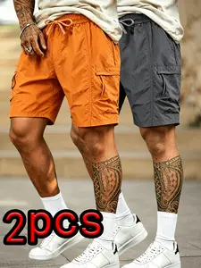 2-pack men’s summer cargo shorts featuring a drawstring waist, made from lightweight polyester fabric with multiple functional pockets; suitable for everyday casual wear, the beach, or outdoor activities. Drawstring-waist shorts, lightweight shorts.