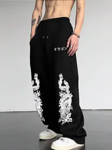 Baggy Black Cartoon Print Pants With Japanese Dragon Print & Kanji Text — Edgy Anime Streetwear! Bold White Dragon Graphics, Relaxed Oversized Fit & Soft Fabric For Urban Cool. Perfect For Casual Layering.