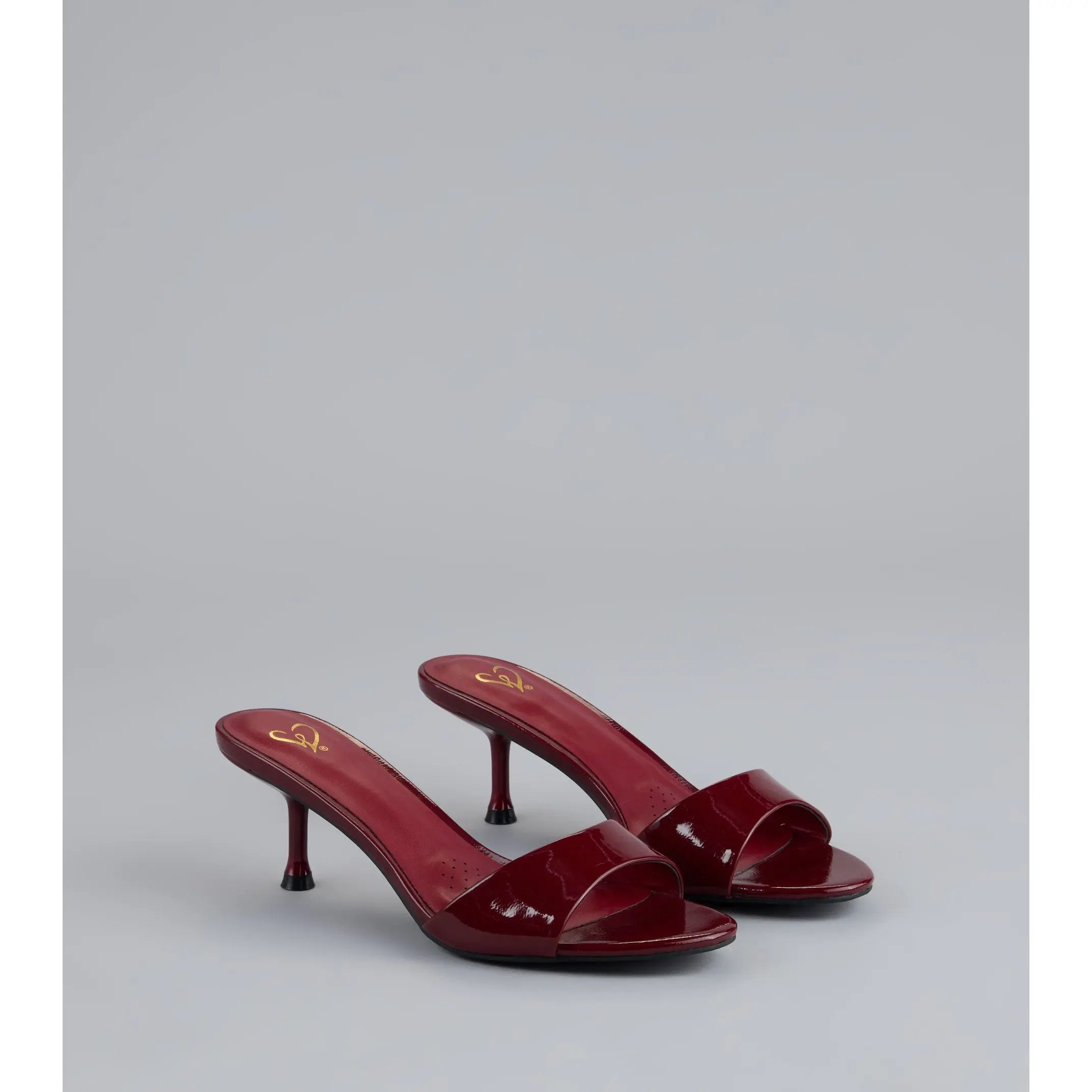 Own the Moment Patent Heeled Mules