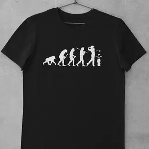 Evolution Of Golf T Shirt from ape through prehistoric man to driving golf player