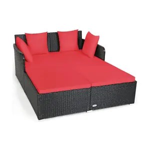 Spacious Outdoor Rattan Daybed with Upholstered Cushions and Pillows