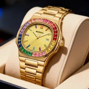 For the bold, discerning gentleman. 41mm gold textured dial, iconic octagonal gold case, Japanese precision movement, and showstopping rainbow gemstone bezel. Elevate every look with head-turning luxury.
