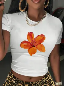 Y2K Aesthetic Orange Lily Floral Print Slim Fit Crop Graphic T-Shirt | Trendy Streetwear Baby Tee Cropped For Summer Casual & Clubwear | Stretchy Cotton Blend, Elastic, Bodycon Silhouette, Eye-Catching Floral Art | Viral TikTok Fashion For Baddie Outfits