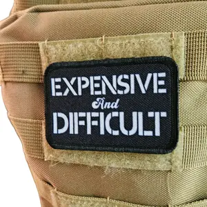 Expensive  and difficult meme black 2"x3" removable morale patch with hook and loop backing