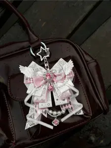 Y2K Anime Music Note Keychain Lace spliced 3D wing design with star foil and bow details. Handmade Lolita bag charm and card accessory. Perfect gift for back to school, weddings, graduation, Mother’s Day, Teachers’ Day and Valentine’s Day.