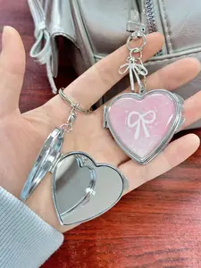 Foldable Dual-Sided Mirror Keychain, Heart-Shaped Bow Pendant, Silver Color Butterfly Knot Bag Charm, Makeup Accessory