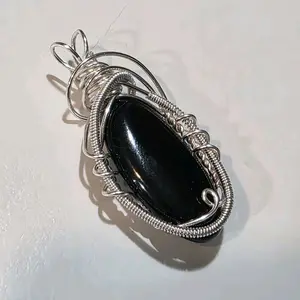 Onyx Hand Wire Wrapped Pendant with 18" Black Cord Perfect for Stylish Outfits and Elegant Jewelry