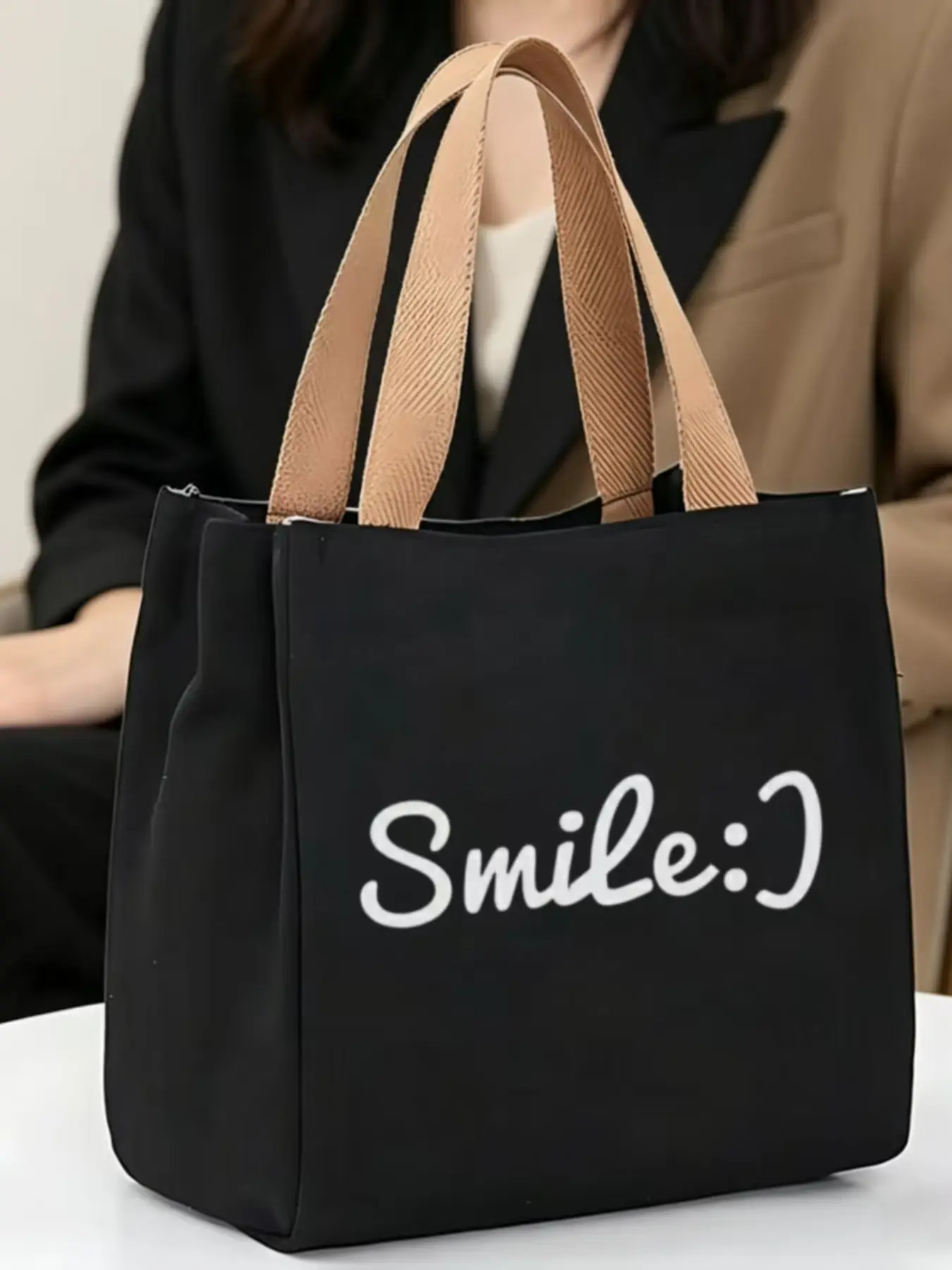#SmileEmojiTote #PlayfulDesignBag | Black Canvas Tote Bag with "Smile" Print & Emoticon, Casual Playful Shopper with Beige Handles, Large Capacity Handbag, Durable & Uplifting, Perfect for Daily Use & Gifts