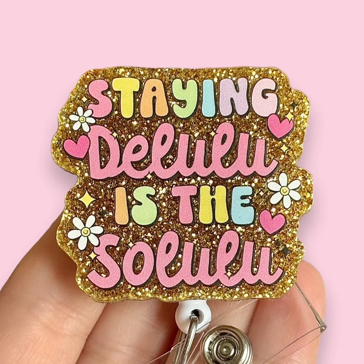 Glitter My Badge Staying delulu is the solulu badge reel for nurses and hospital workers. Badge clip Badge pull - Retractable swivel clip with a 360 rotation. Great gift for coworker.