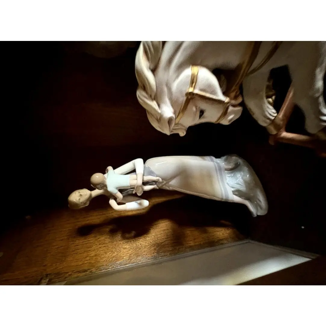 Porcelain Figurine of Woman with Child